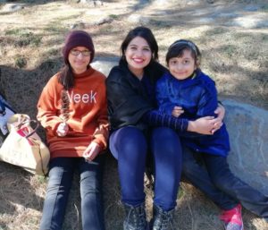 Annie with the kids, having a family time. Occasions like these are perfect to sing rhymes with kids